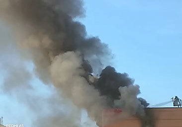 Smoke coming out of the top floor of the Ibis hotel in Malaga.