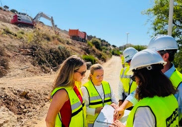 Ana Mula (2l) visits the new sports mountian project.