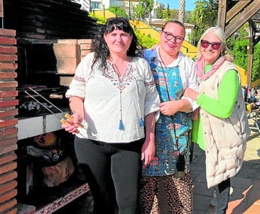 Ana Katrina (centre) with her mother (right) and neighbour Lourdes at their joint 50th BBQ earlier this year
