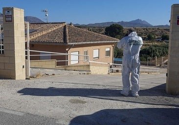 A Guardia Civil officer at the villa where the woman and her daughter were found dead.