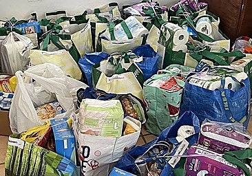 Bags of food and hygiene products at Lux Mundi