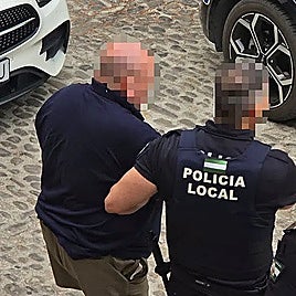The Local Police accompanying the man who threatened the Mayor of Ronda.