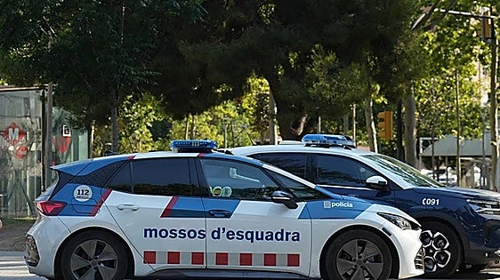 Barcelona police arrest man on suspicion of killing his wife in front of their children and setting fire to their car before fleeing