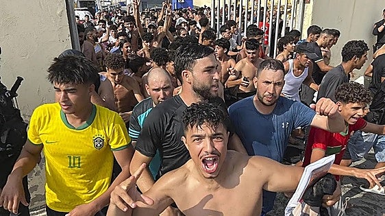 Spain's government deploys military units in response to the arrival of 20,000 migrants in Ceuta