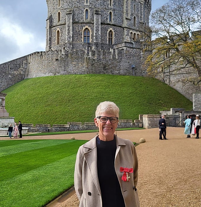 Sue Wilson with her MBE at Windsor Castle