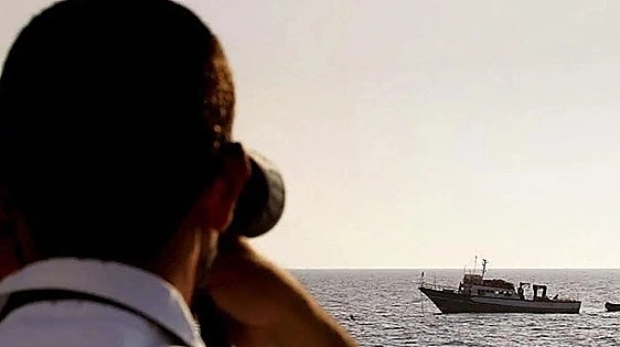 Italian coastguard officer aboard a ship in the Mediterranean