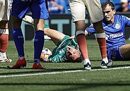 Malaga goalkeeper Alfonso Herrero with a gash on his head following a collision with Francho.