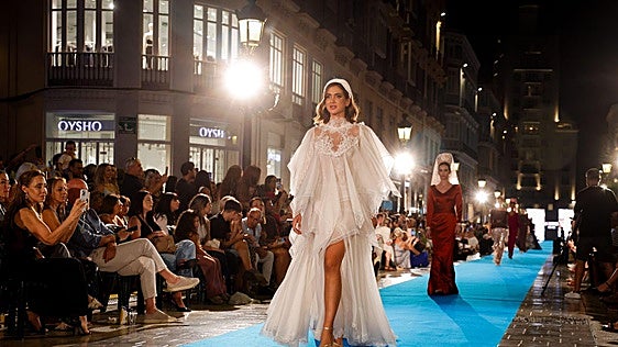 Some of the models on the blue catwalk on Friday night.
