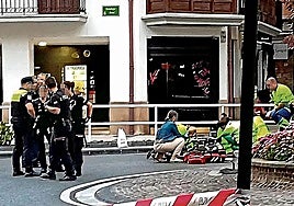 Paramedics treating the man who collapsed at the roundabout where the incident took place in Hondarribia