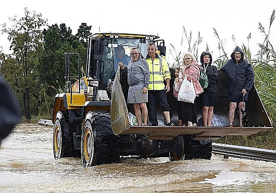 'This is a disaster': Oliva resident who survived 1987 floods rescued by digger after terrifyng night in attic