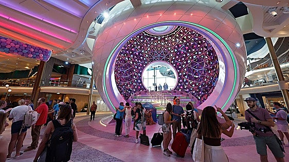 The world's largest cruise ship sets sail on its maiden voyage from Malaga