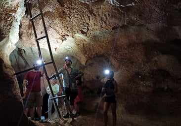 Visitors at the Cueva de la Victoria.