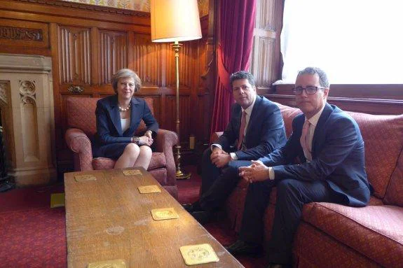 Fabian Picardo (centre) and Dr Joseph Garcia with Theresa May