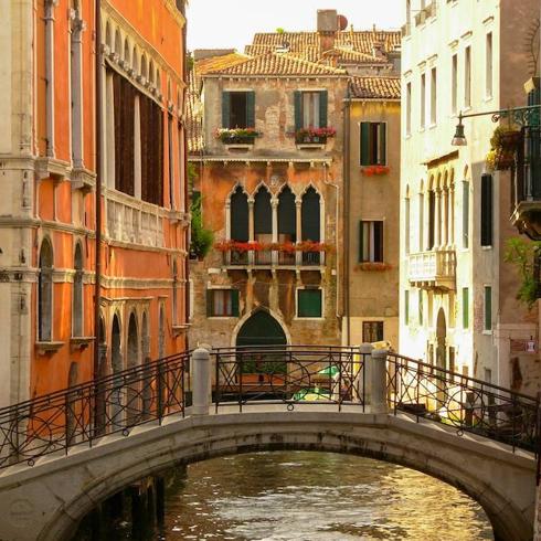 Venice’s canals and bridges are best admired in the early morning or late evening.