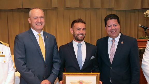 Christian with the Governor (left) and chief minister.