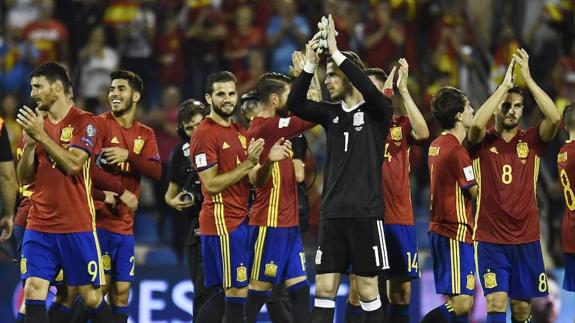 Spain celebrate their victory against Albania.