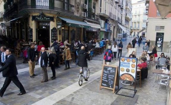 Furniture cannot occupy more than half of the pavement.