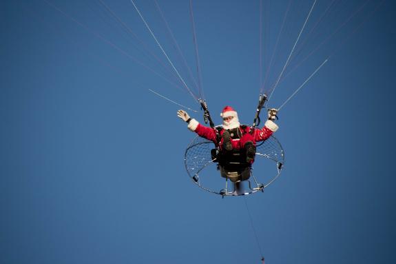 Santa flying in the blue skies of the Axarquía.