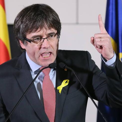 Puigdemont speaking in Belgium after separatists repeated their overall majority.