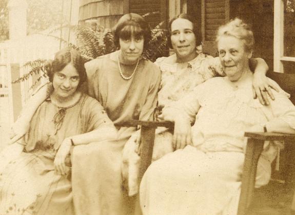 Isabel (second on the right), with other women of her family.