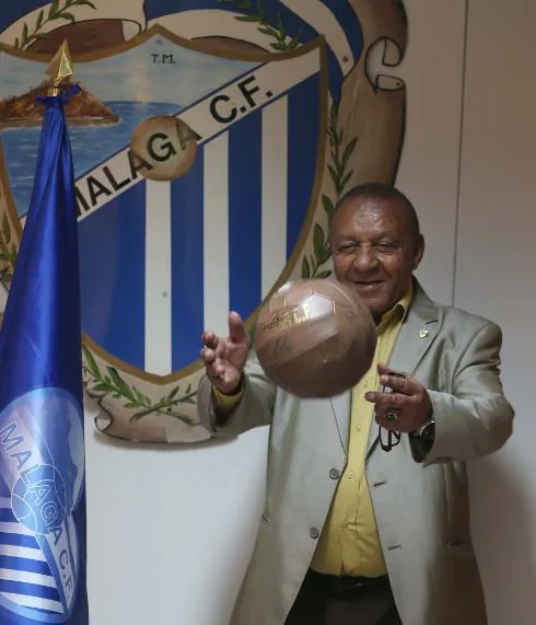 Ben Barek in the offices of Malaga football club with a retro-style ball.