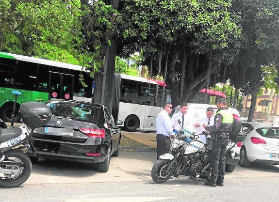 Local Police officers in Marbella check the documents of hire-on-demand drivers.