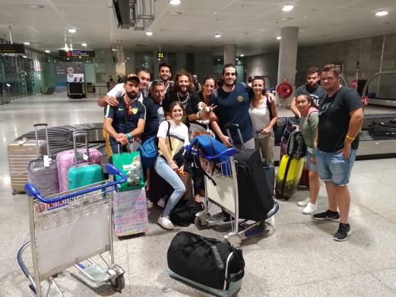 The group of workers, with little Mauri, after arriving back at Malaga airport.