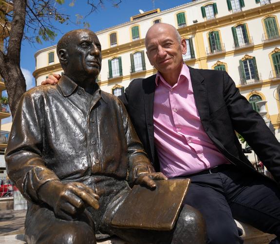 Phil Grabsky this week with the sculpture of Picasso in Malaga.