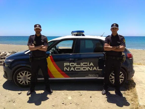 Javier and José Miguel on the beach where the rescue took place.