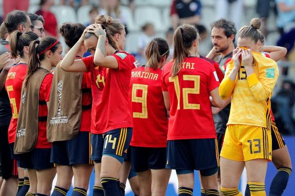 The Spain players following their elimination.