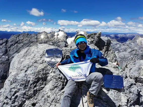 David Rodríguez poses on the summit of the Carstensz Pyramid.