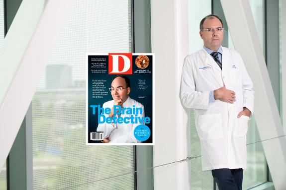 Dr Pascual with the cover of the magazine.