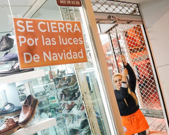 Malaga shops close in protest over Calle Larios Christmas lights