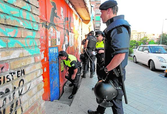 Police are called to investigate an illegal squat.