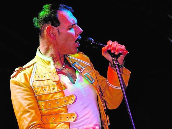 Gary Goodmaze as flamboyant Queen singer Freddie Mercury. 