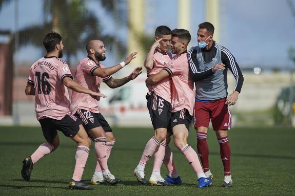 Marbella celebrate the opener.