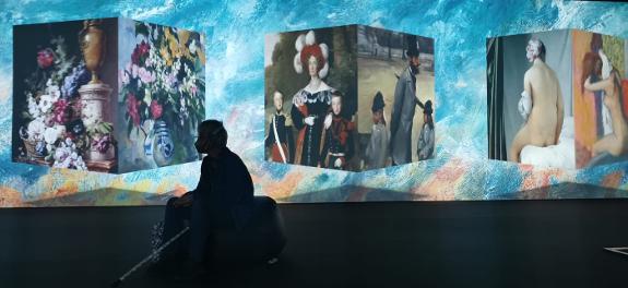 The works by impressionist artists are shown on huge screens over four metres high and 16 metres wide.