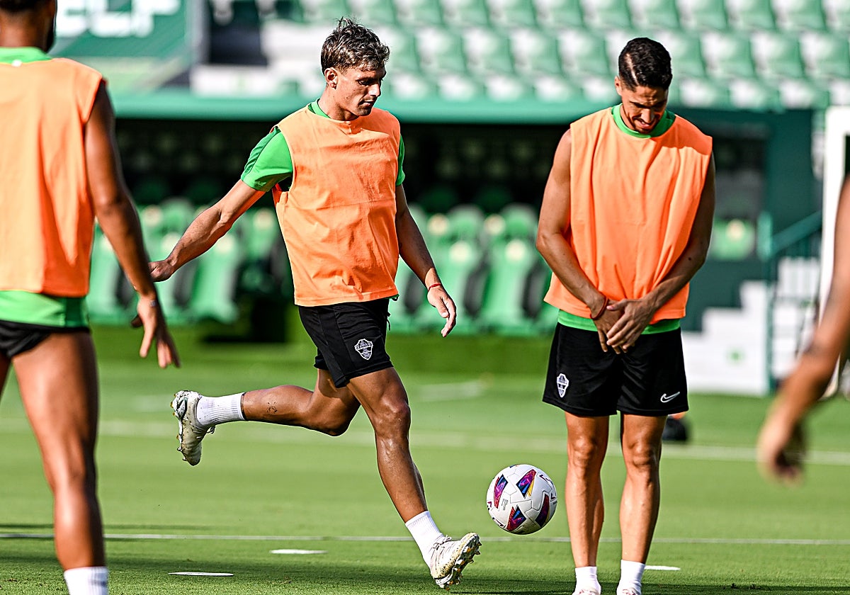 Lucas Boyé y Fidel, durante un entrenamiento