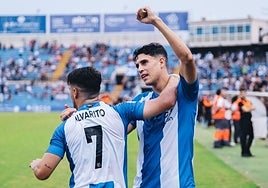 Colomina y Alvarito celebran el gol del primero al Torrent