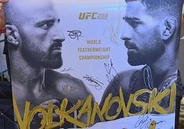 Cartel del Volkanovski-Topuria firmado por Ilia.