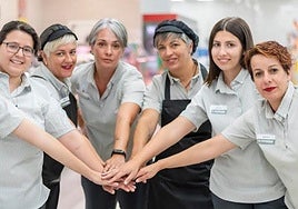 Empleados de Masymas Supermercados.