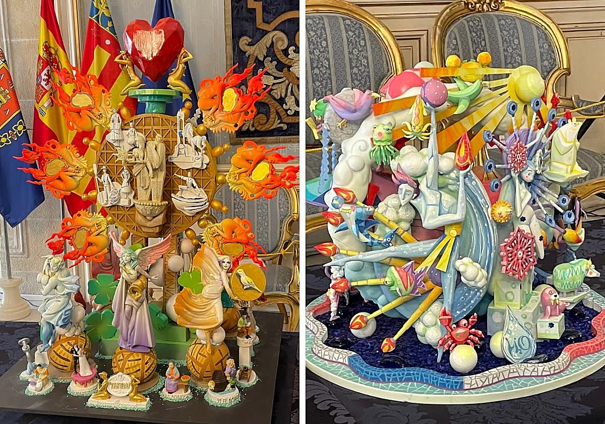 Los artistas de las hogueras oficiales junto a las maquetas.