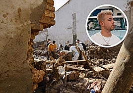 Paiporta tras el paso de la DANA y Raul Clyde, autor de 'El pueblo salva al pueblo'.