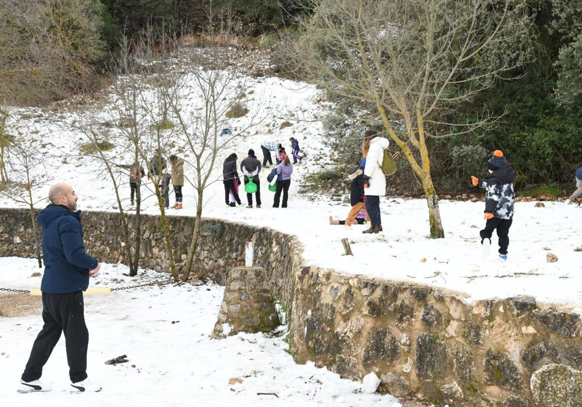 People enjoy the snow in Alicante.