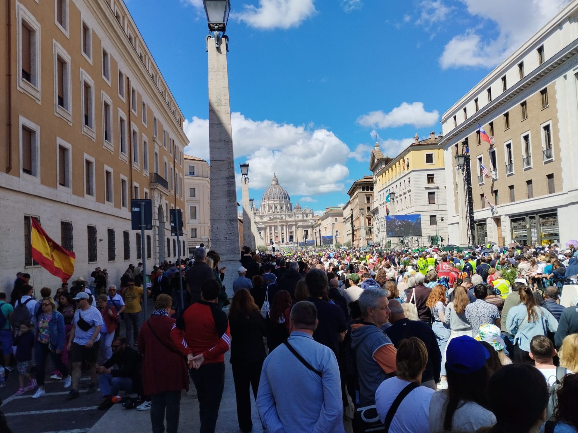 The faithful try to get closer to St. Peter's Square.