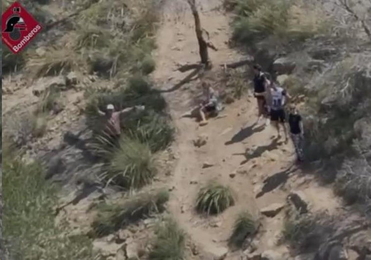 The injured woman on the trail.