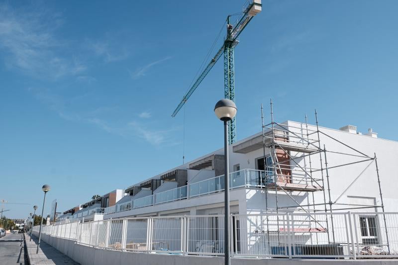 Construction of housing, in archive image.