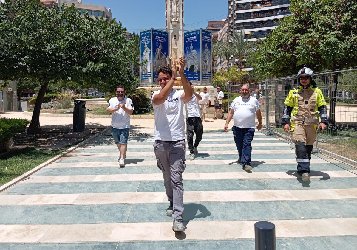 Adrián Sirvent, son of Pedro Luis, applauds the crowd from Luceros after the mascletà.