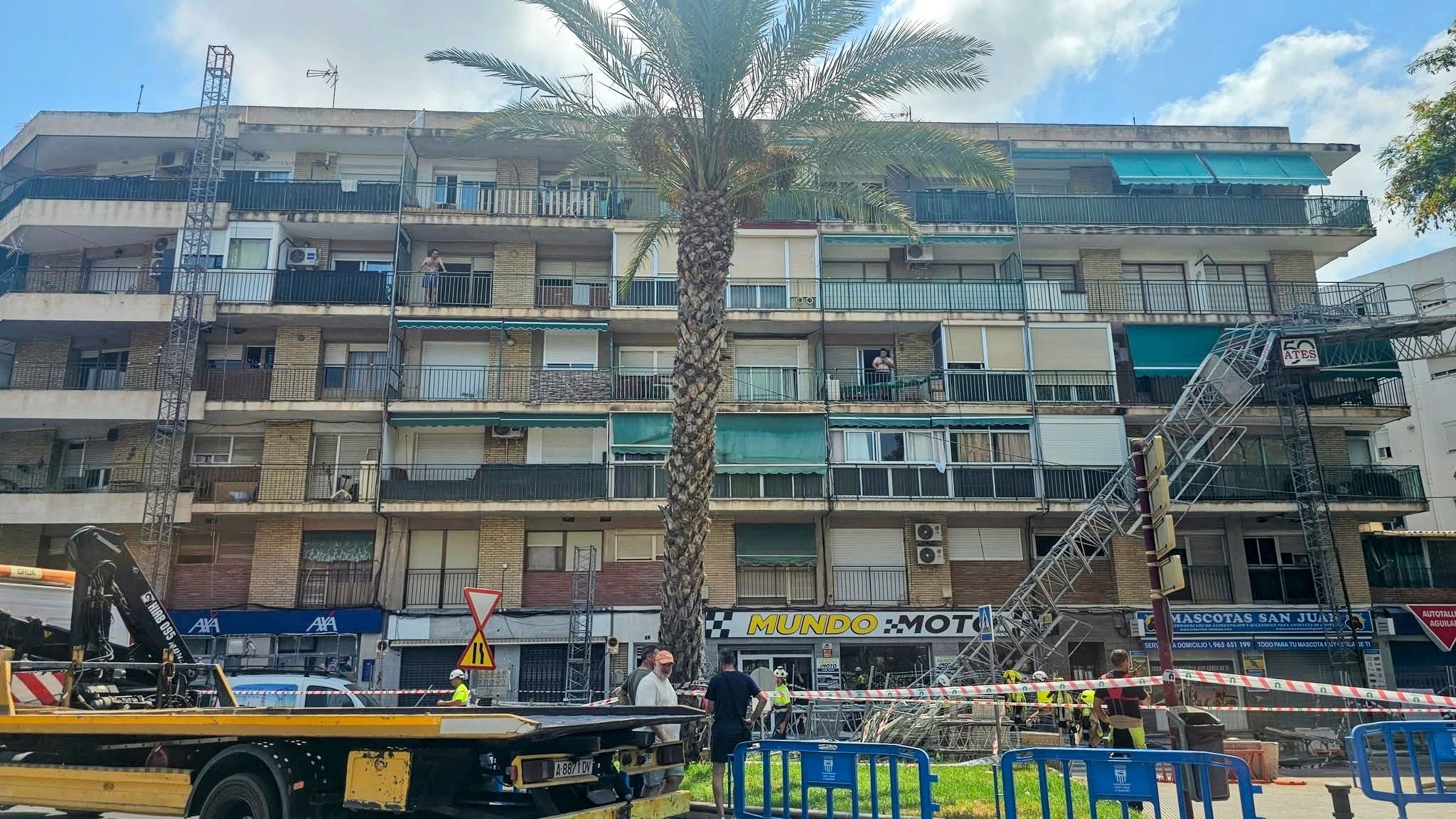 Building with the scaffold on the ground.