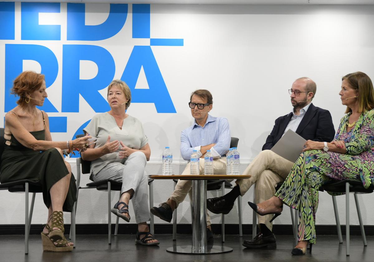Los ponentes en un momento del debate.